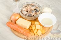 Слоёный рыбный салат с крекерами, морковью и сыром
